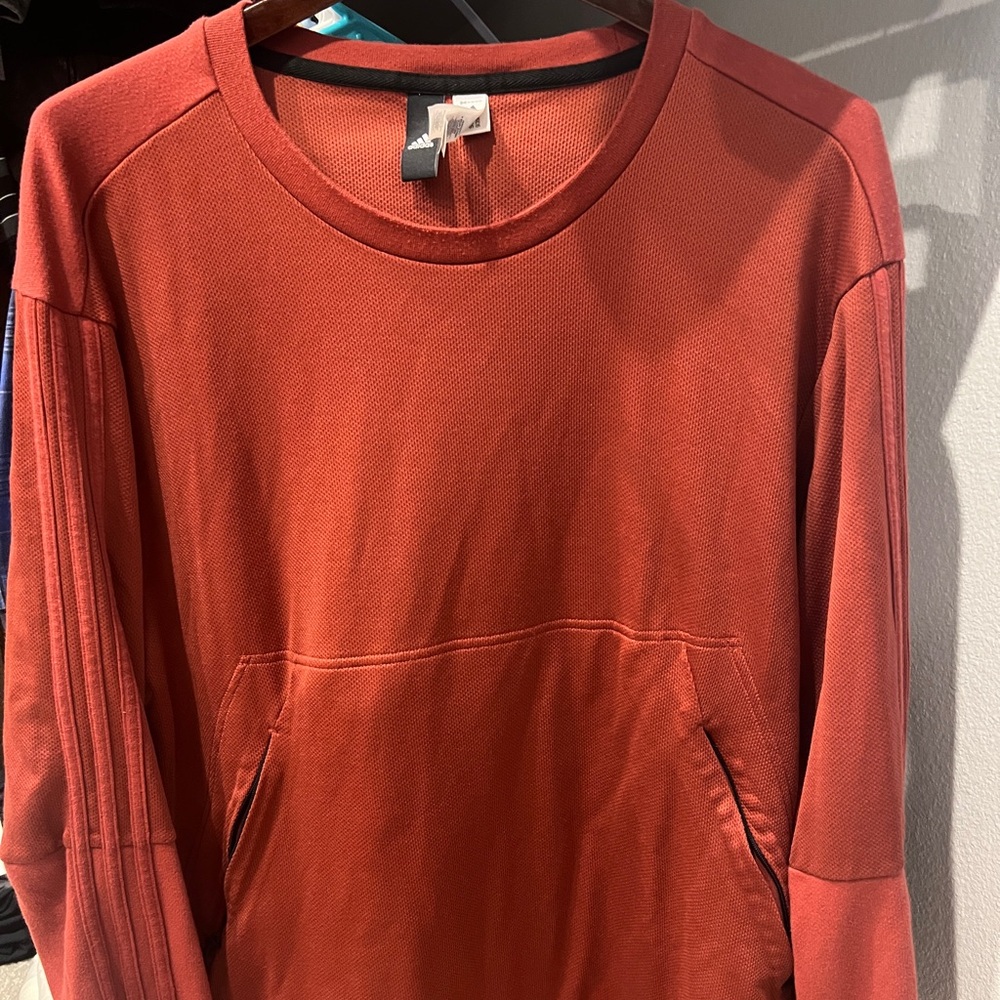 Adidas sweatshirt.
